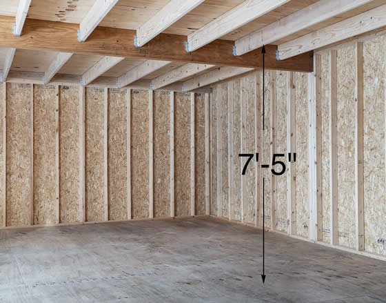The Roanoke 16x32 Wood Shed has 7.5 ft of headroom